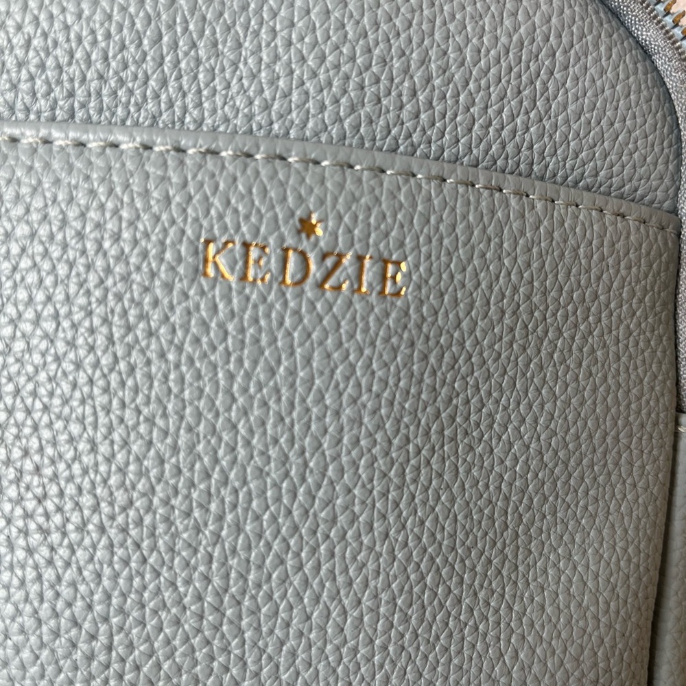 Kedzie Pebbled Light Gray Backpack with Gold Accent